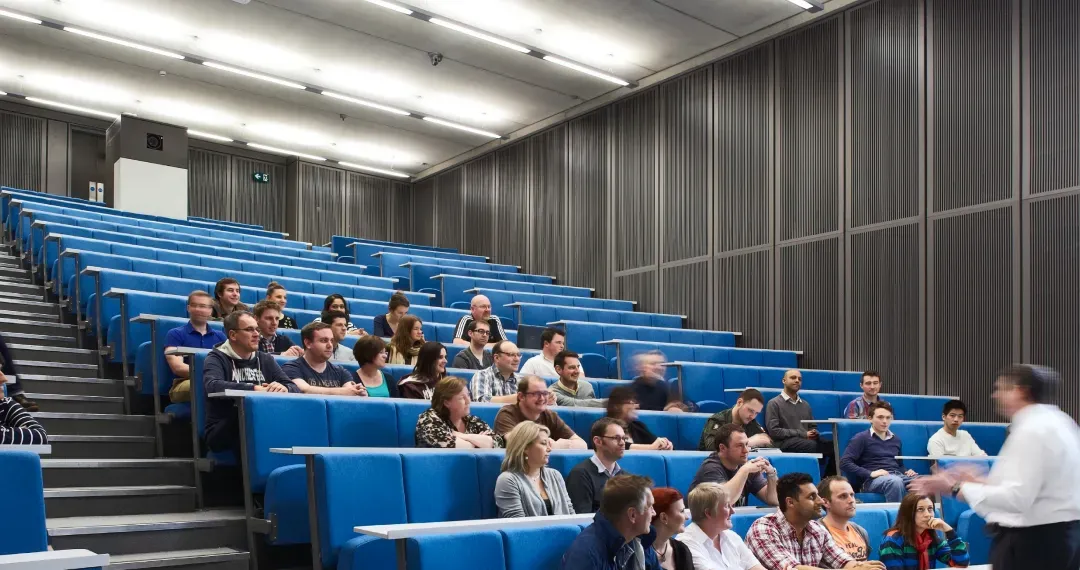 Auditorium is designed to seat a large audience with advanced audio-visual systems & including high-definition projectors