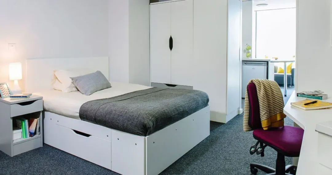 Five or six en suite rooms share a kitchen, dining and living space