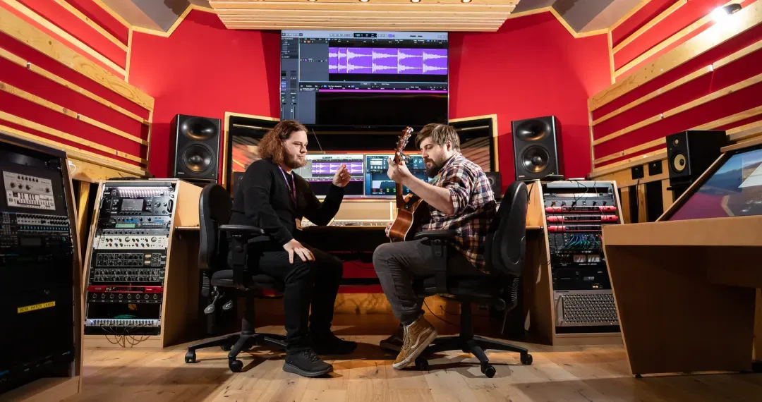 Music Recording Studio with high-quality microphones, mixing consoles, audio interfaces, and software tools