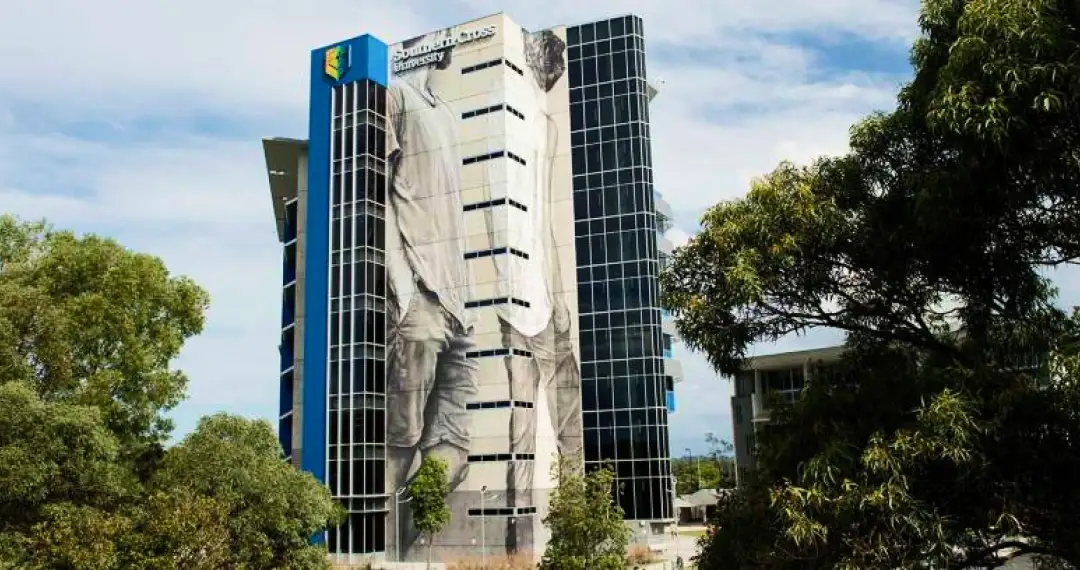 Masterpiece mural by artist & alummnus Guido van Helten in 2018 at Building B